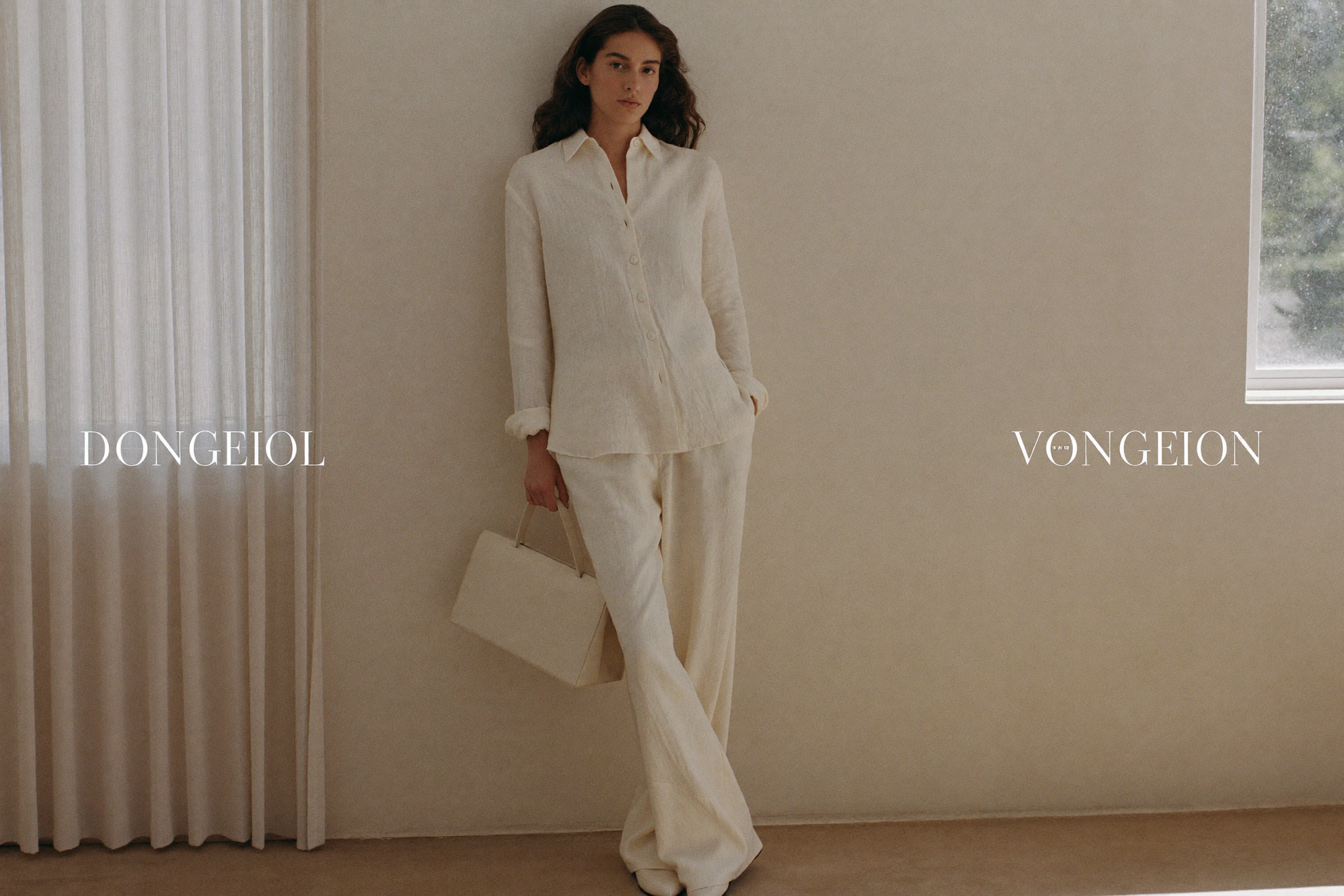 Mooi Muse linen campaign, woman in oat-cream linen in a warm sunlit interior
